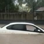 Carro fica submerso e avenida interditada durante chuvas em Juazeiro do Norte TEMA LIVRE